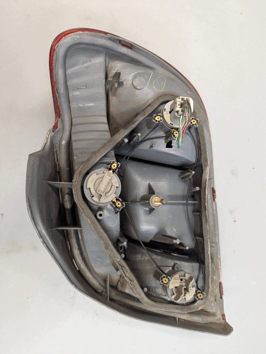 Фонарь левый задний Toyota Yaris I 5308701, фото 4