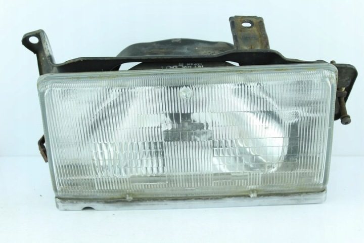 Фара передняя Nissan Stanza левая 1195DOT Nissan, фото 1