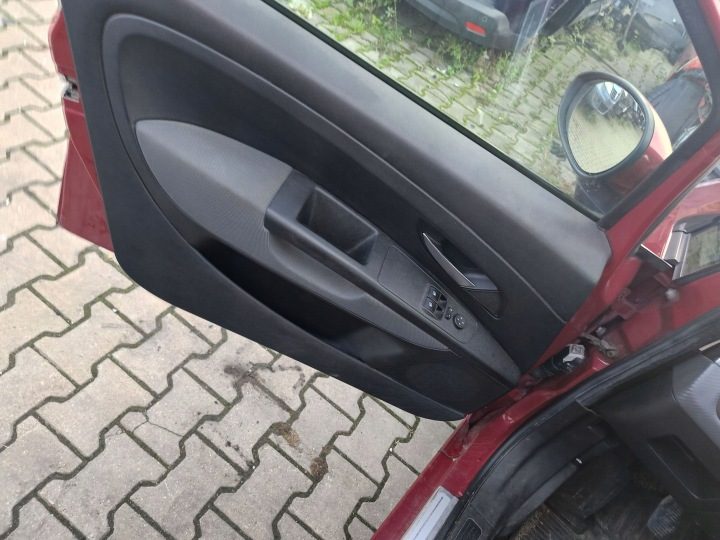 Обшивка двери левая передняя Fiat Grande Punto 06-10, фото 1