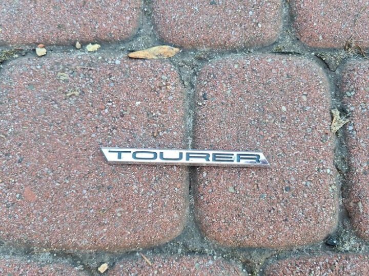 Надпись логотип эмблема TOURER Opel Zafira C, фото 1