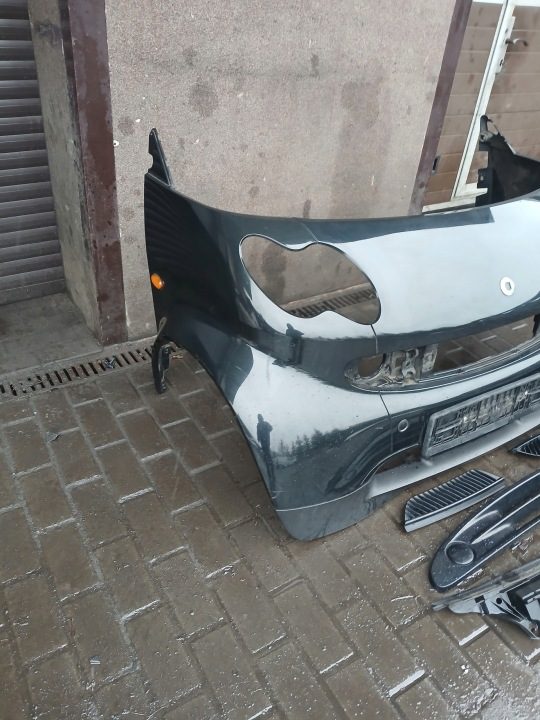 Бампер передний в сборе в хорошем состоянии Smart Fortwo 1 рестайлинг цвет черный EB1 EA4, фото 4