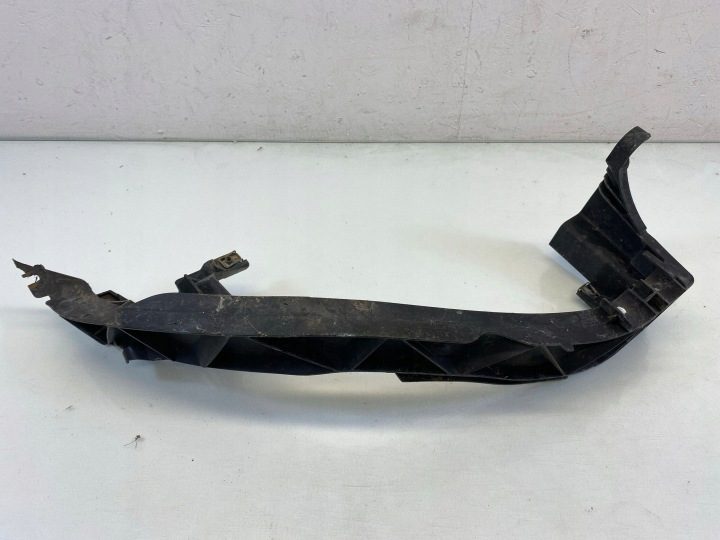 НАПРАВЛЯЮЩАЯ КРЕПЛЕНИЕ БАМПЕРА ФАРЫ ЛЕВОЕ ПЕРЕДНЕЕ 7120823 BMW 1 E81 E87 10 г., фото 1