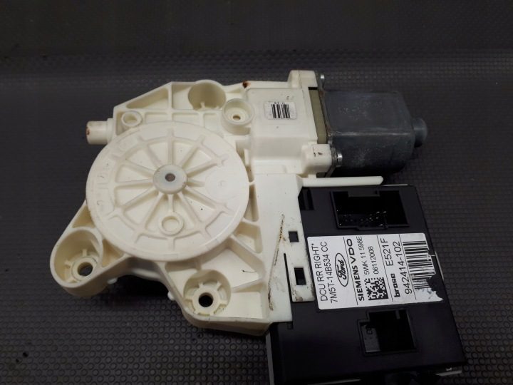 Моторчик стеклоподъемника Ford OE 7M5T-14B534-CC, фото 1