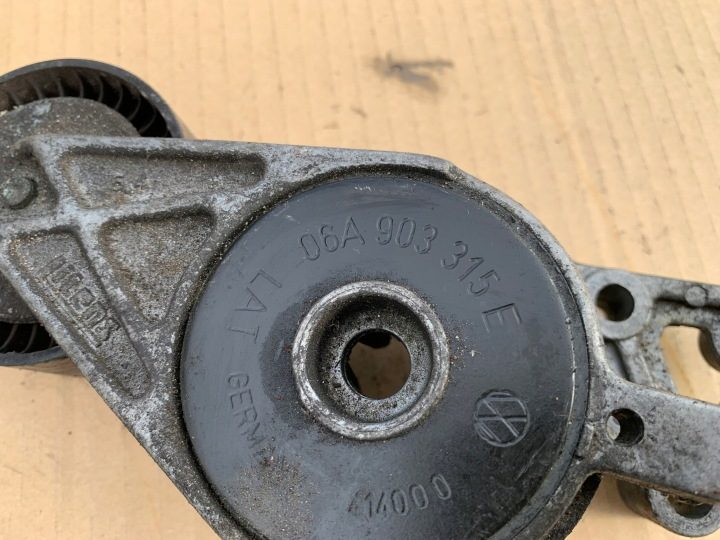 НАТЯЖИТЕЛЬ РЕМНЯ РОЛИК 038903315F AUDI VW SKODA ОРИГИНАЛ 100% ИСПРАВНЫЙ, фото 2