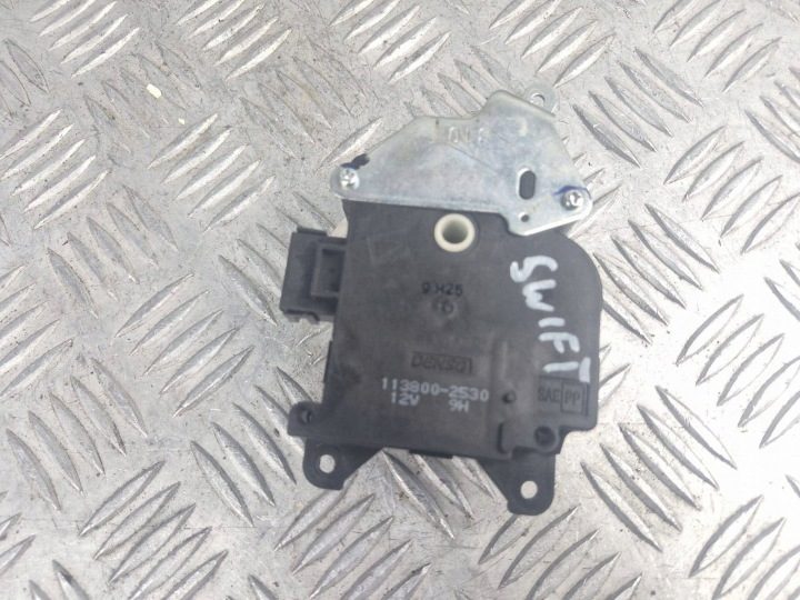 Моторчик заслонок обдува Suzuki Swift I 1138002530, фото 1