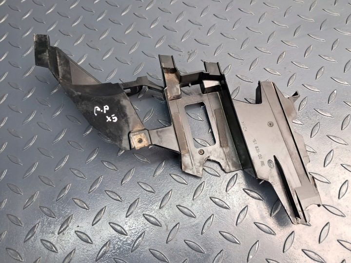Направляющая КРЕПЛЕНИЕ фары правое переднее Hella 8 386 710 BMW E53 X5 дорестайлинг, фото 1