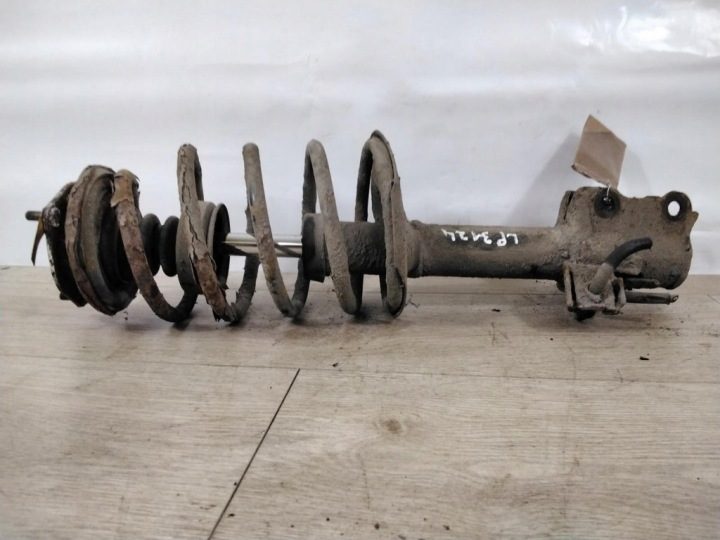 Nissan Almera N16 стойка левая, фото 1