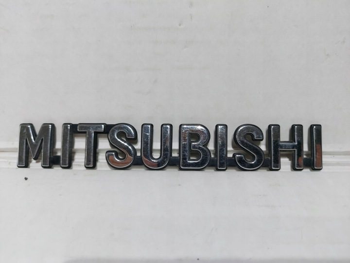 Значок эмблема надпись Mitsubishi 7415A479, фото 1